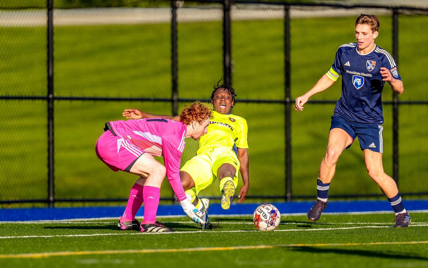 Goalkeeper challenge during a Hershey FC semi-pro soccer match, by Deanna Fox, SportsFox Photography, Hershey PA