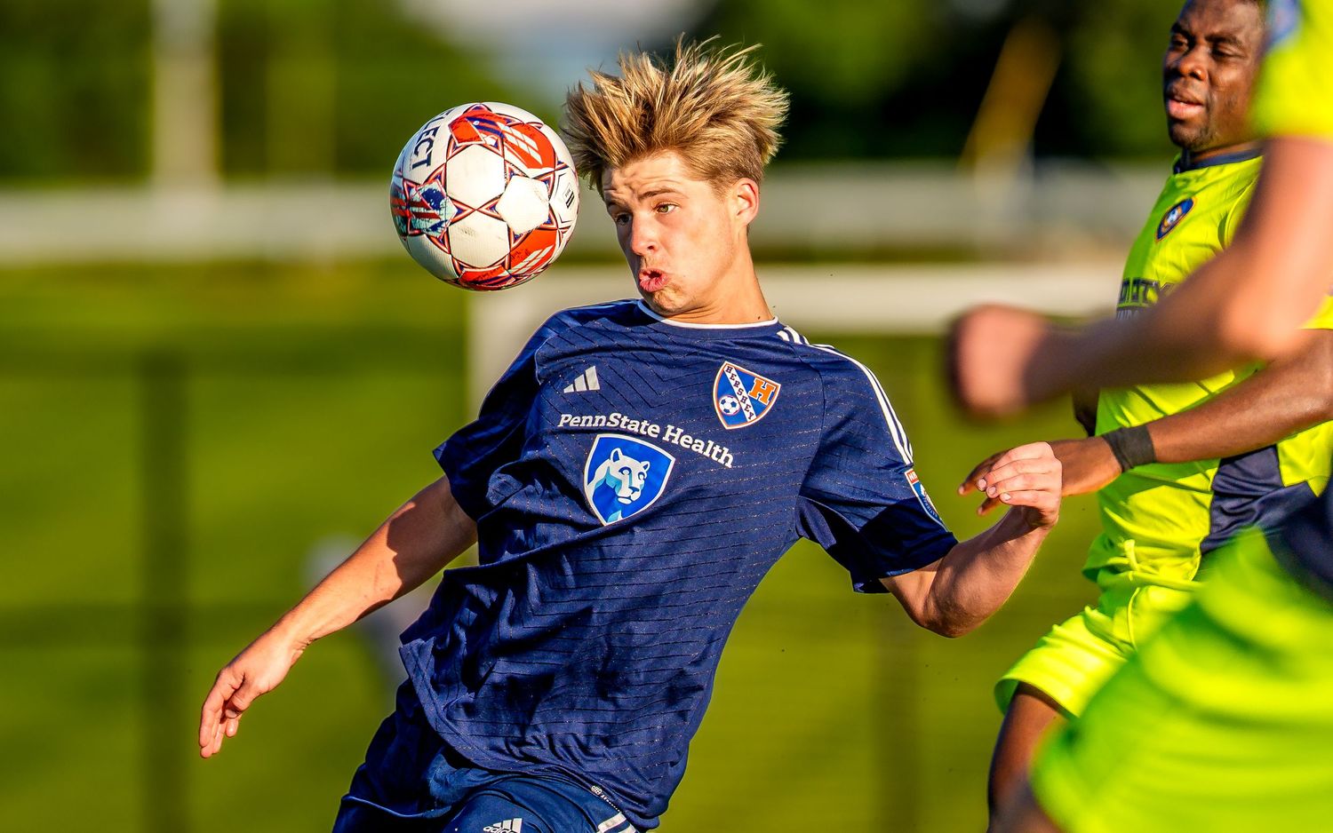 Hershey FC player controls the ball in an NPSL men's soccer match, by Deanna Fox, SportsFox Photography, Hershey PA