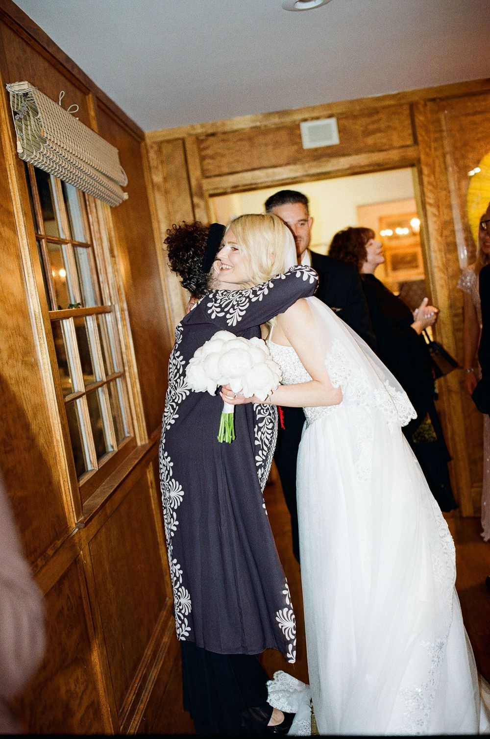 Unstudied, intimate ceremony moments at a Santa Barbara family home. Hybrid film photographer now booking in NC.
