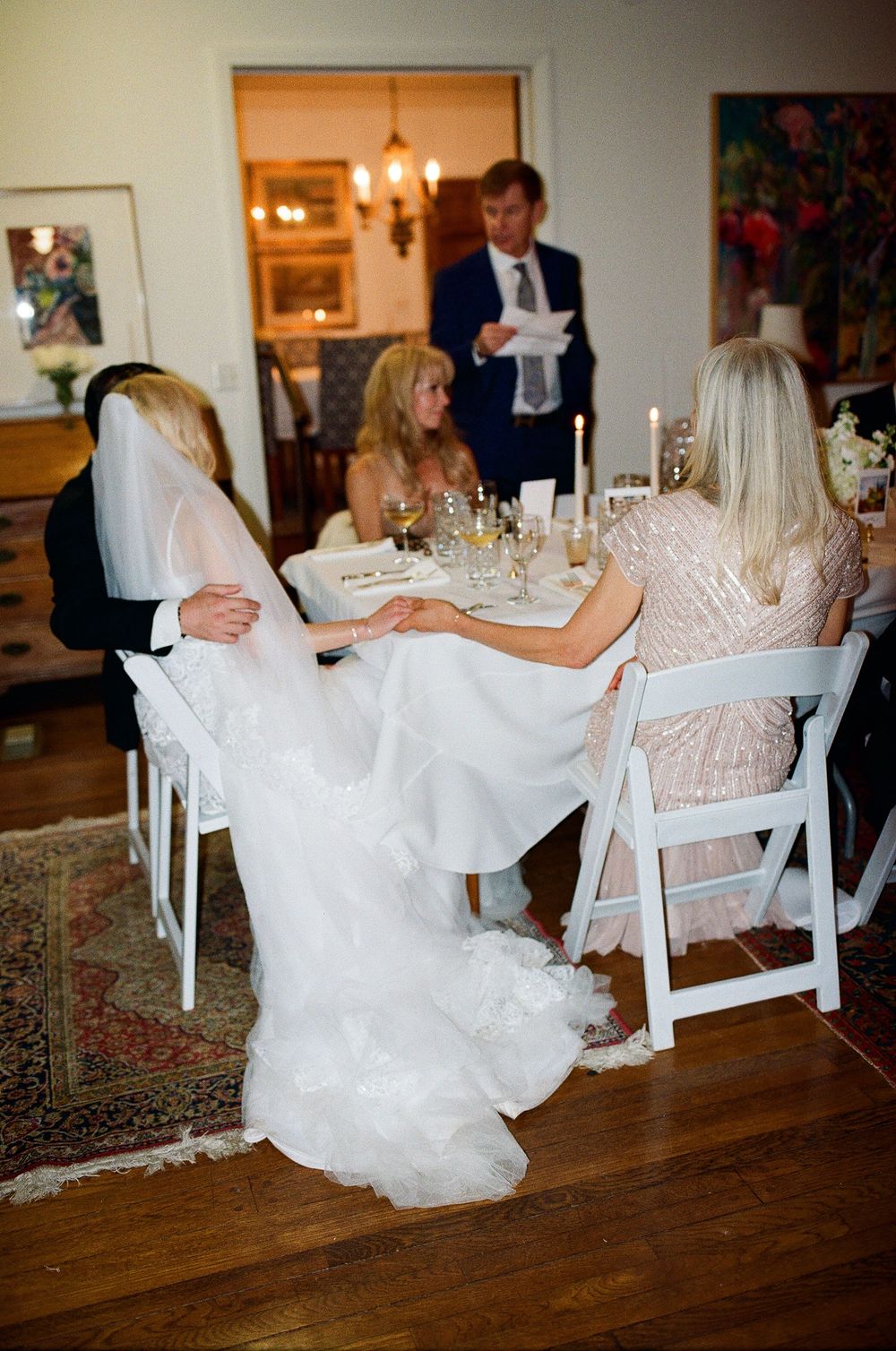 Late-night flash wedding photo at a Santa Barbara estate reception. High-end candid style for CA and NC.