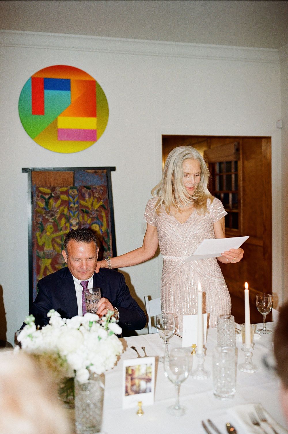 Toasts at intimate wedding captured on film photography