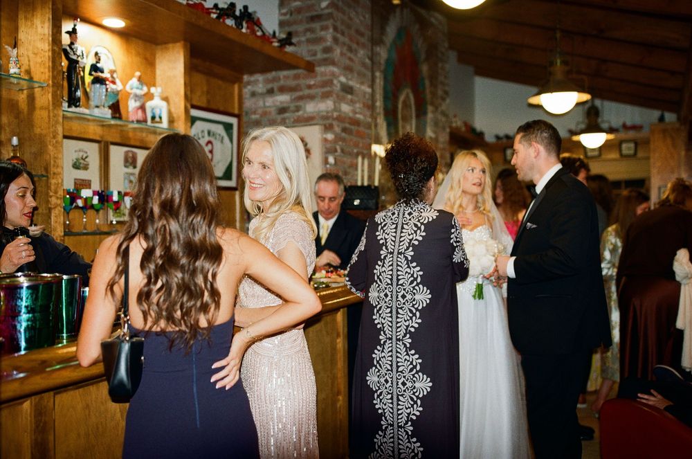 Direct flash wedding portrait capturing a real, unforced connection. Serving Southern CA and North Carolina.