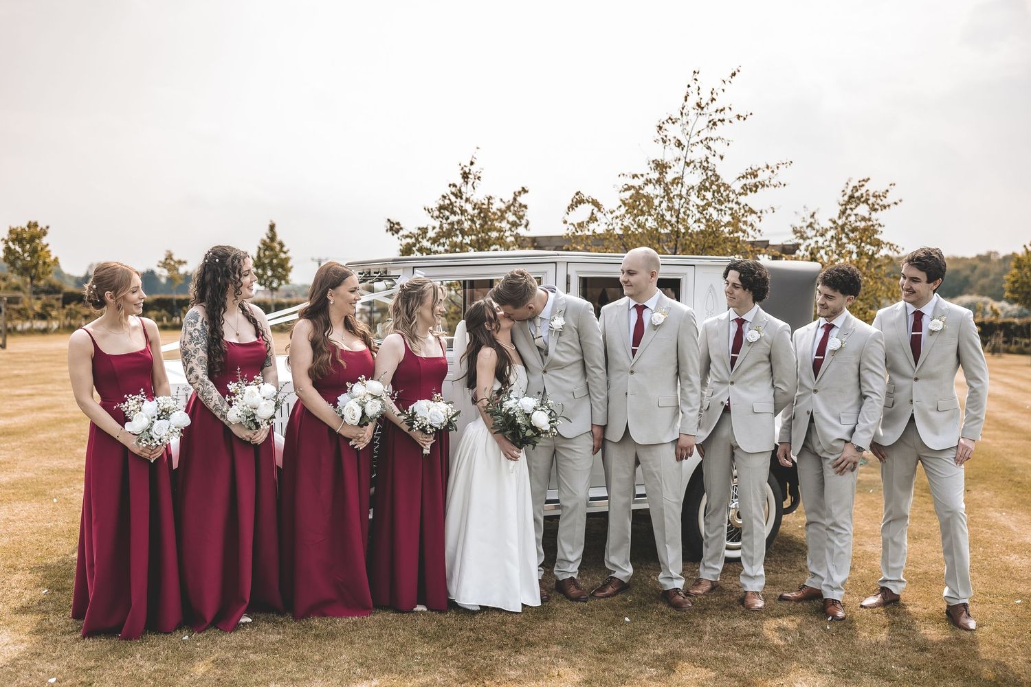 One of many group photos taken on a wedding day, one of few posed photos taken on a wedding day.