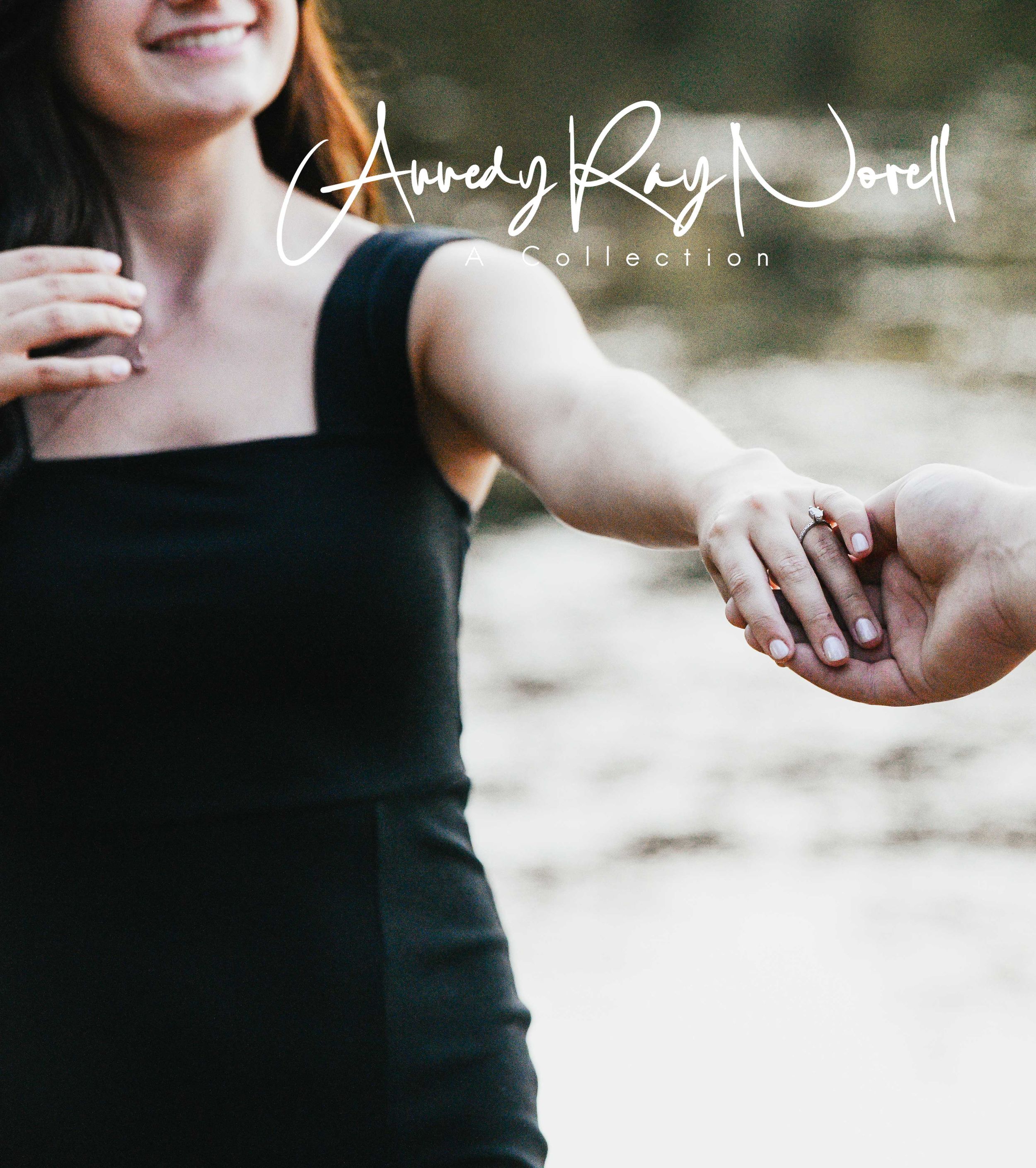 A smiling woman in a black dress holds hands with someone, showcasing an engagement ring, with a watermark overlay.