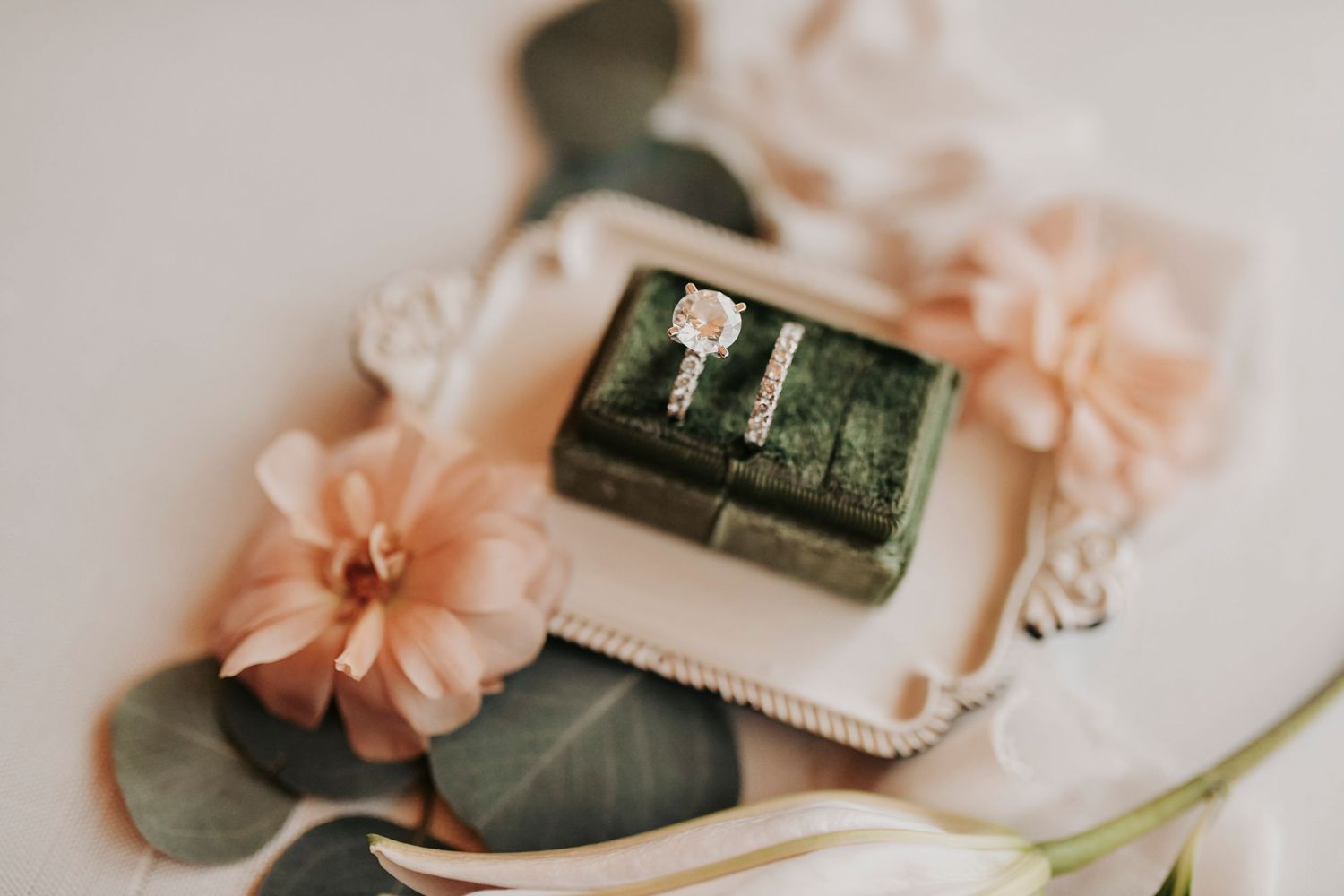 wedding flat lay with fresh floral stems and greenery bringing detail styling to life