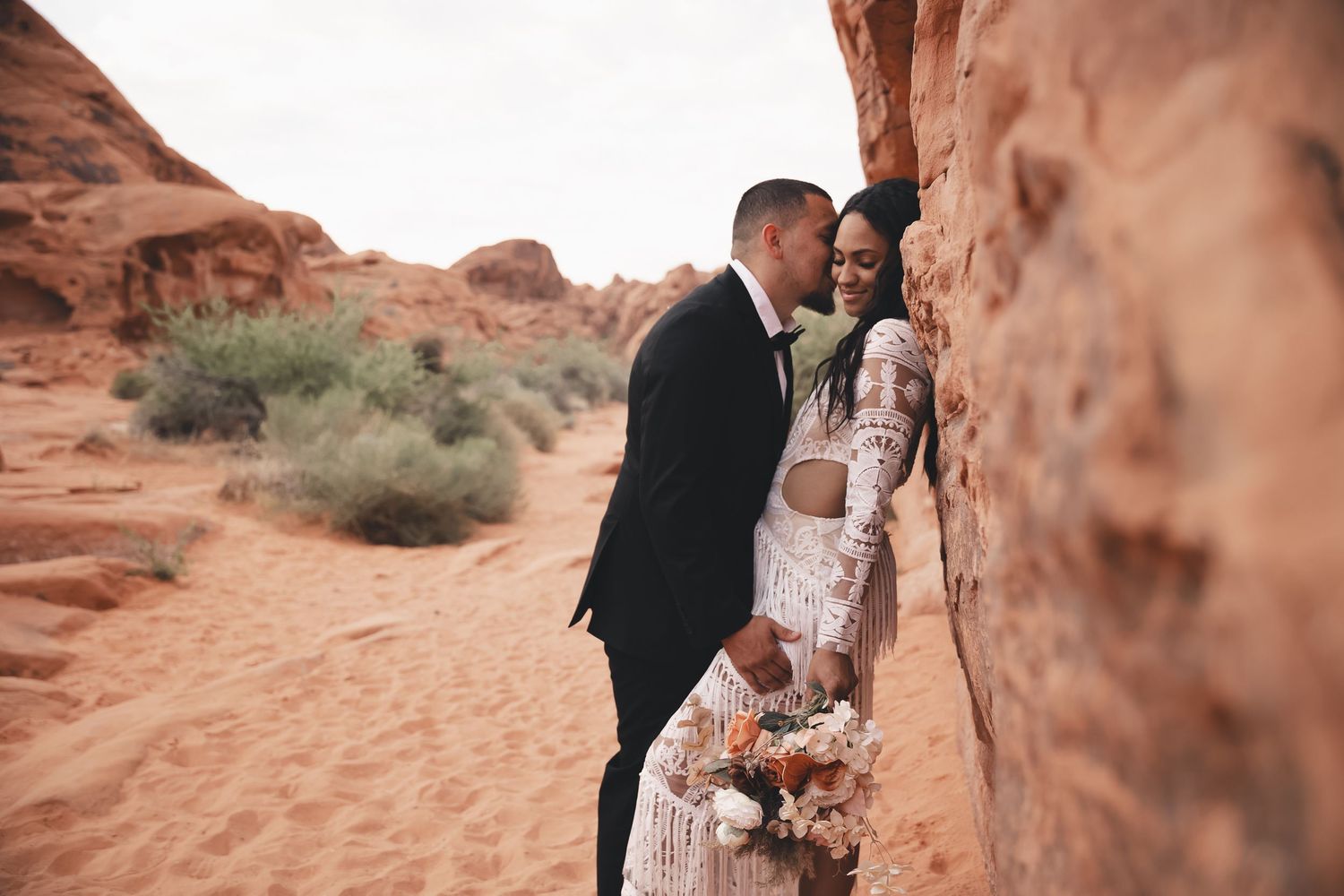 Adventurous desert elopement in the Valley of Fire, Las Vegas. Romantic photography capturing love among red rocks and stunning landscapes.
