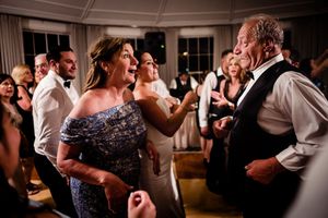 Parents of the groom share a dance during the reception at The Equinox Resort in Vermont