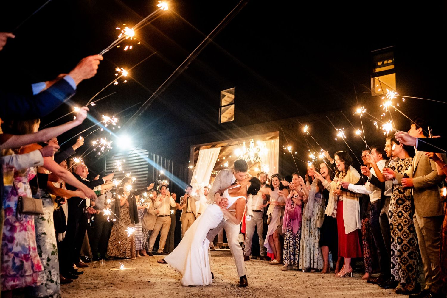 a sparkler send-off at the end of a wedding reception in Vermont at The Old Gray Barn