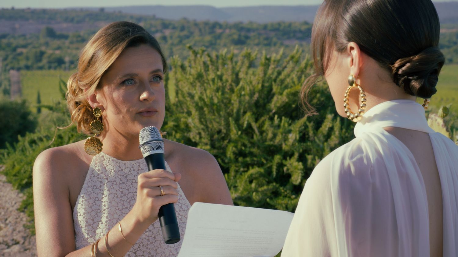 A split-screen collage of people celebrating at an outdoor event amid green vineyard scenery.