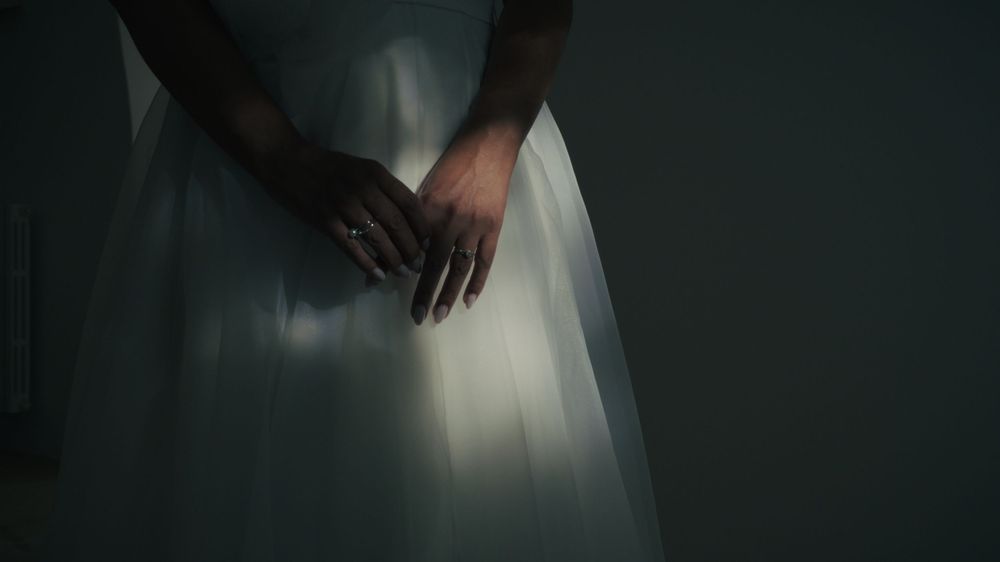 Professional wedding photography series showcasing a bride's flowing white dress from various artistic angles.