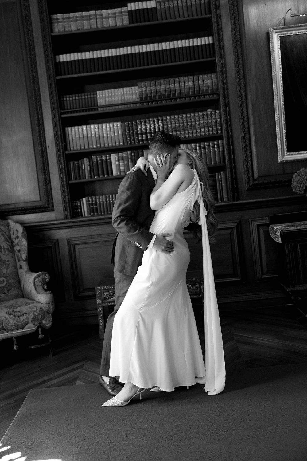 Bride and groom in elegant attire at Filoli Gardens, Woodside CA, during a romantic summer engagement session
