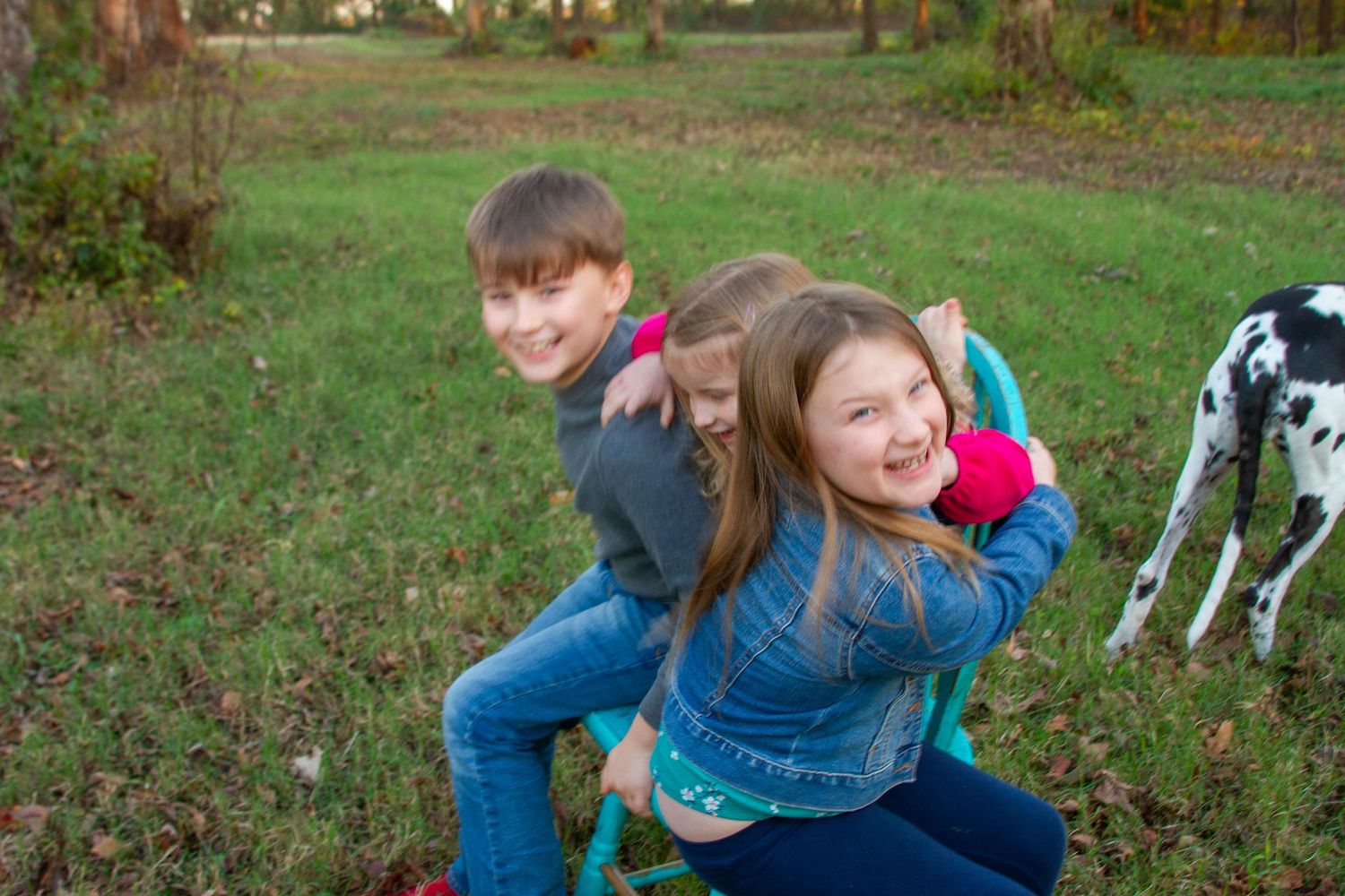 playful siblings photographed by Delta Blossoms Photography in Manila, Arkansas