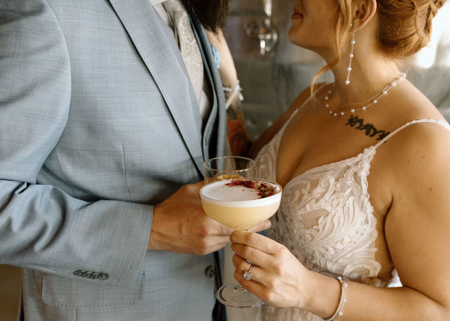 Close-up shots of a couple sharing intimate moments while eating cake at a wedding reception.