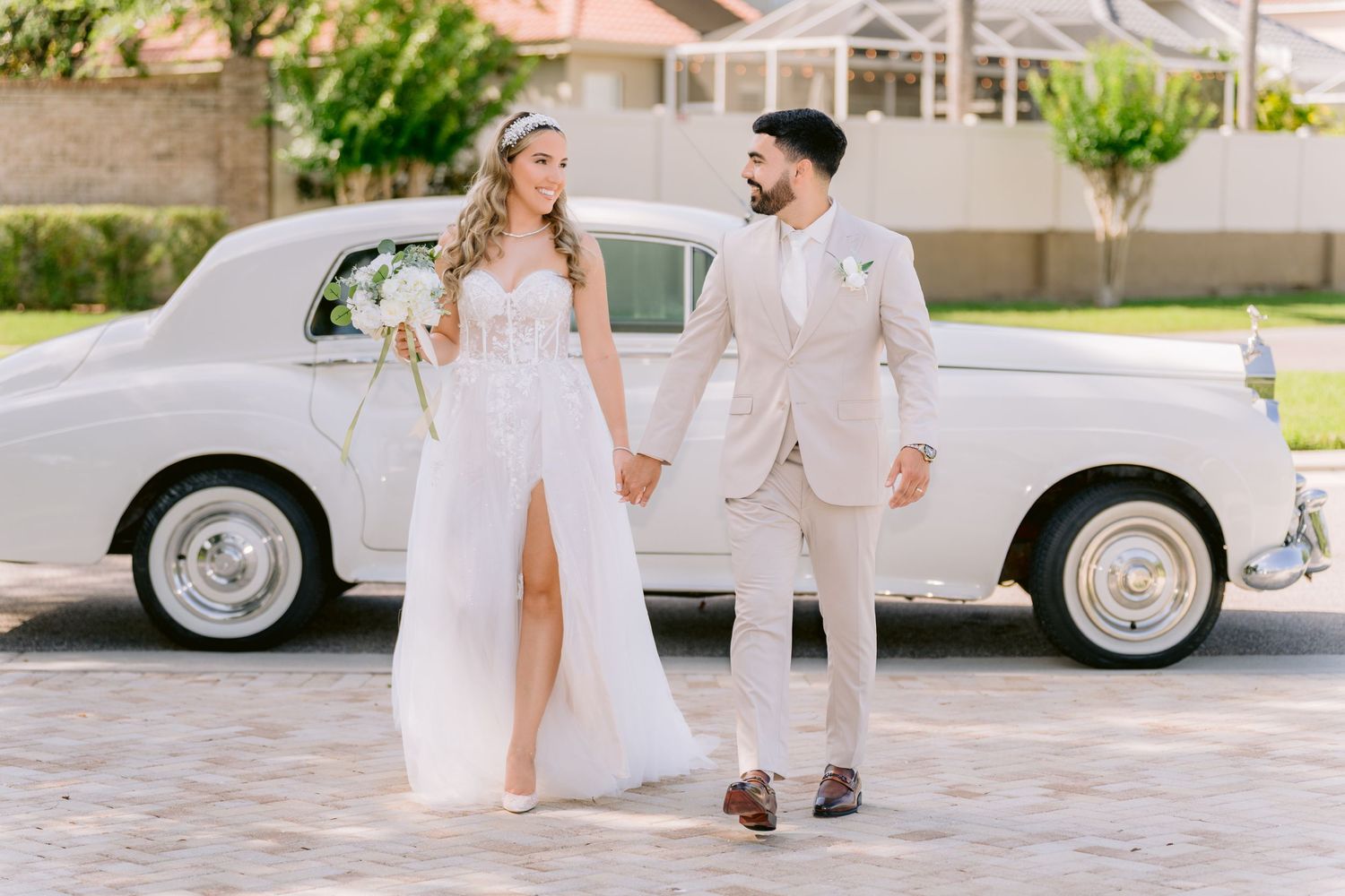 A collection of wedding photos showing romantic moments between newlyweds at Harborside Chapel,  in white attire beside a vintage car.