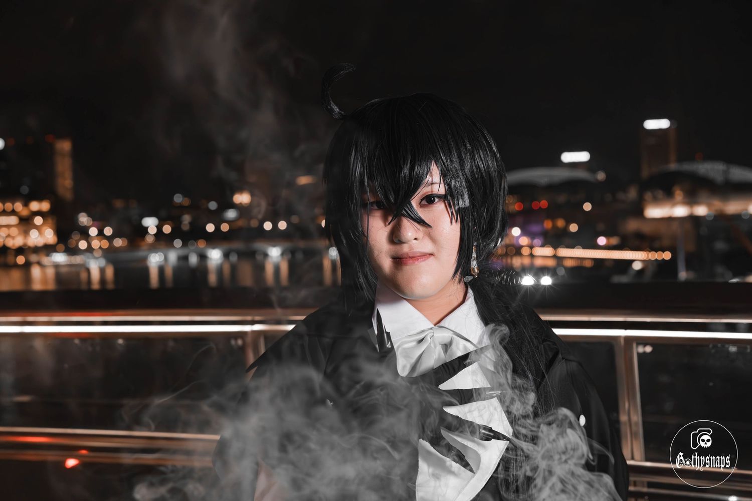 A Bsd Cosplayer poses at the helix Bridge near Marina Bay Sands Singapore.