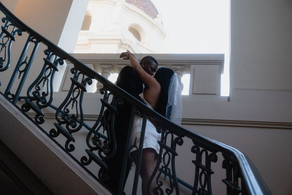 Emotional couple portrait at Pasadena City Hall courtyard