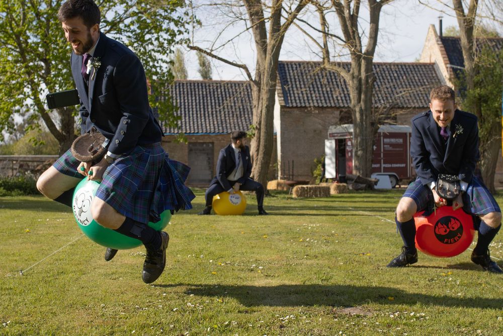 People enjoying outdoor games and activities on a sunny spring day.