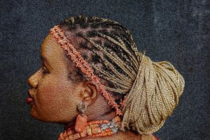 Photography Oil painting  Side profile showing intricate braided hairstyle with coral-colored beaded accessories of the Igbo bride.