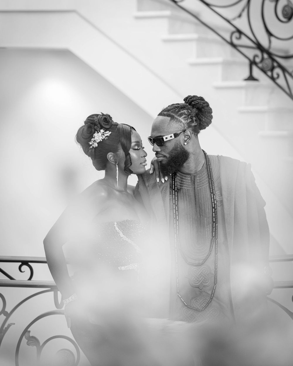 A romantic black and white photo sequence shows a couple in a tender embrace with a soft, dreamy effect.