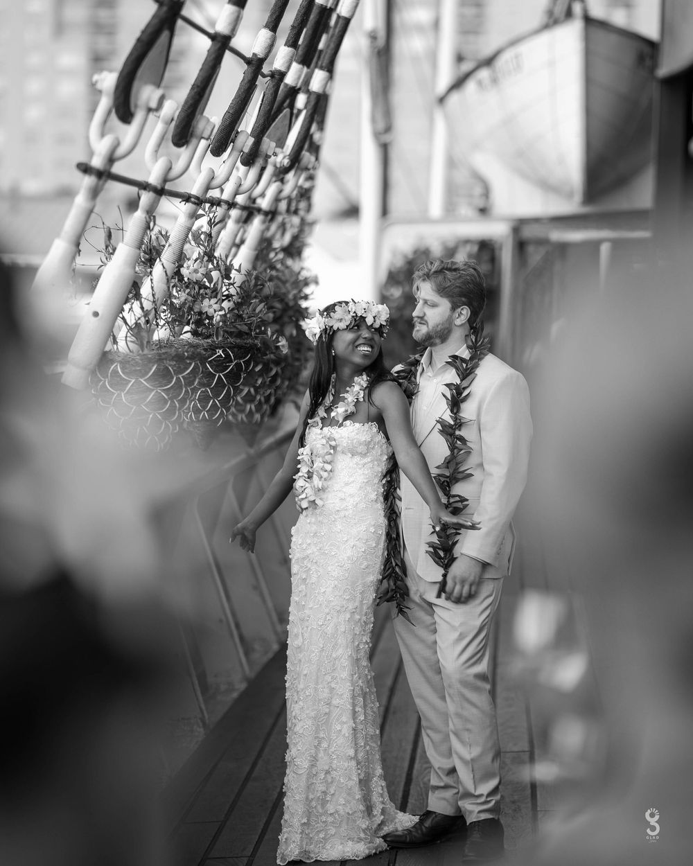 Black and white wedding photo series showing couple dancing and embracing during their romantic celebration.