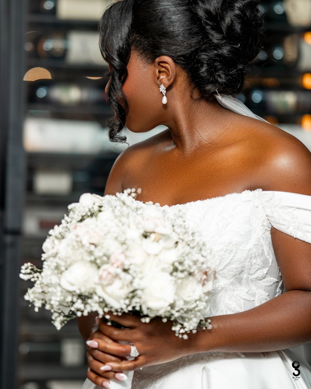 A close-up series of wedding photos showing delicate white floral bouquet details against elegant bridal attire.
