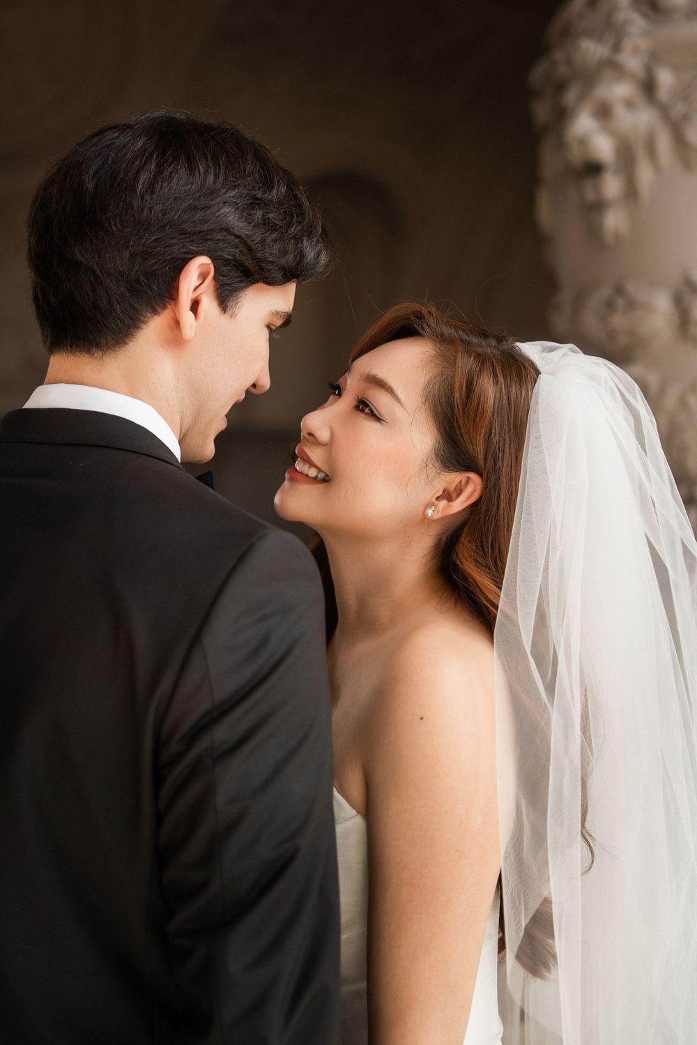 A romantic wedding portrait sequence showing a bride and groom in an intimate close-up moment.