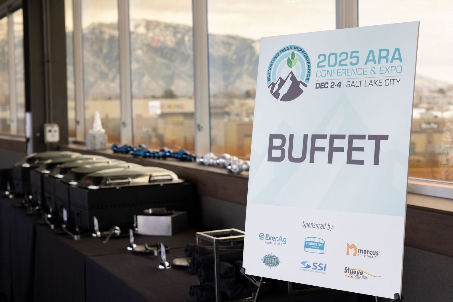Corporate conference branding and signage photographed at Salt Lake City event venue