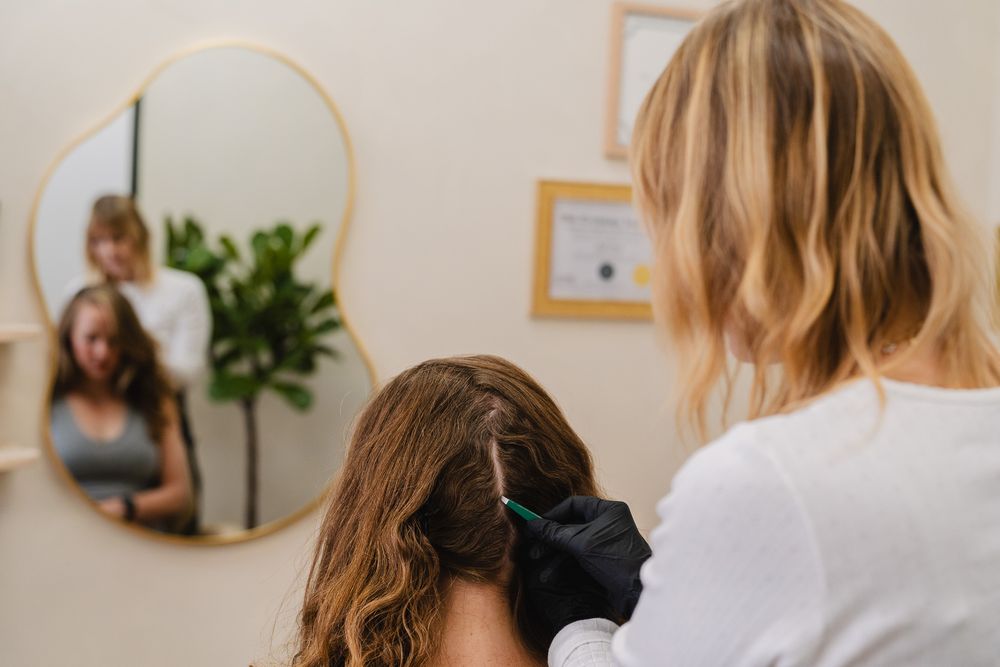 Branding photo of Jill working with a client in her Eagle Rock studio taken by a Los Angeles branding photographer.