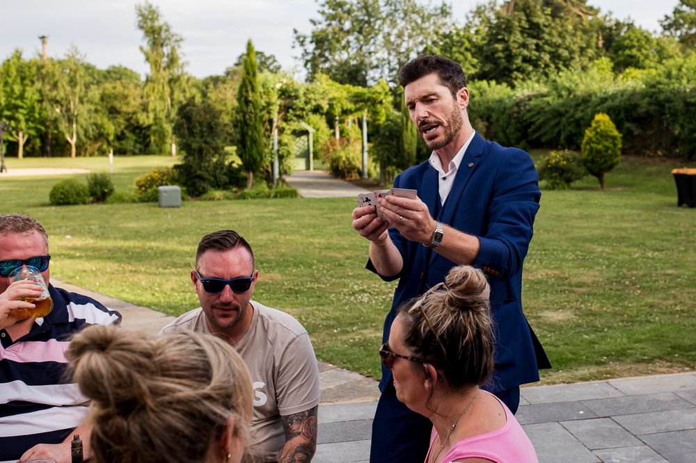 Outdoor wedding games and activities on a sunny lawn.