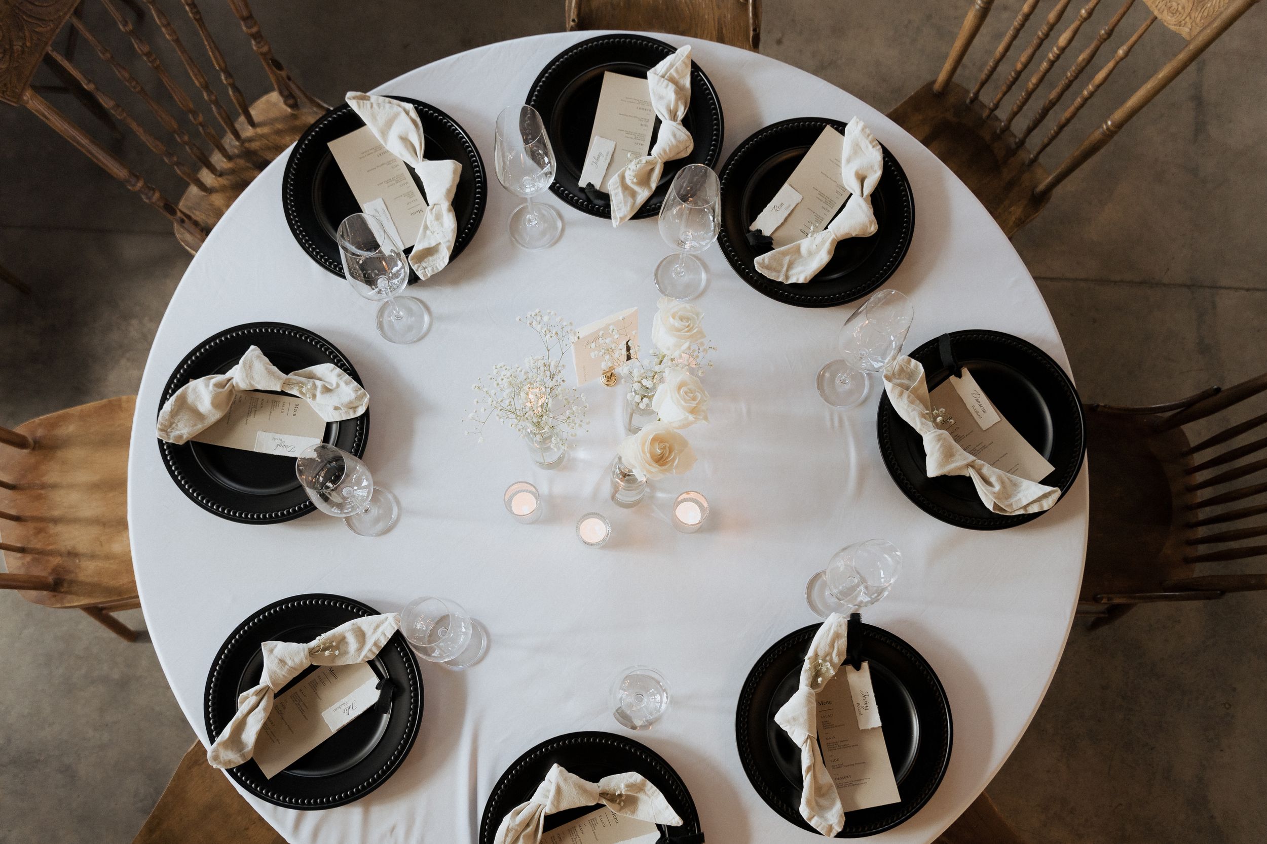 Timeless elegant wedding decor, simple black and white, film vibes, aesthetic wedding decor, bespoke wedding at Tire Shack Brewery Moncton