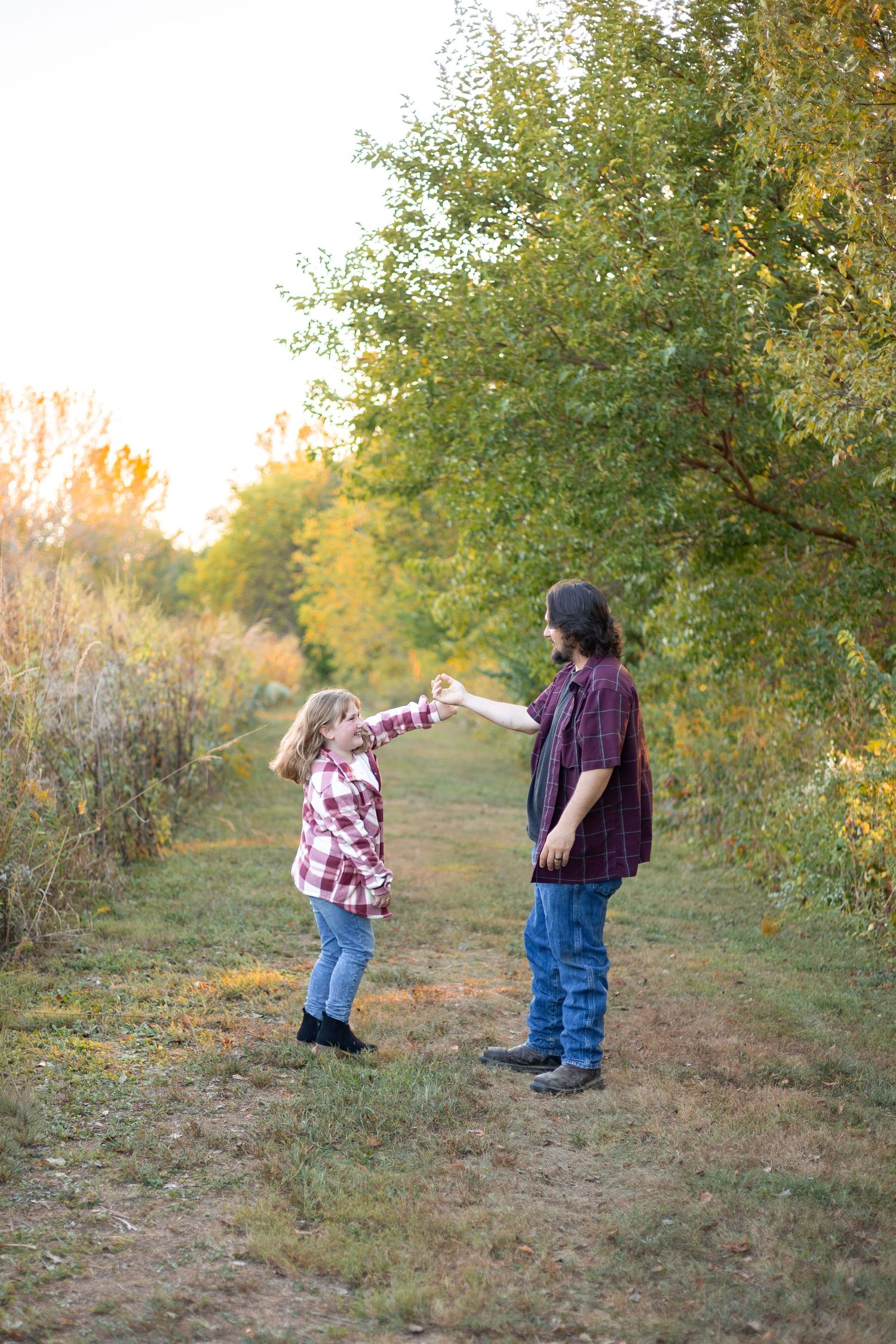 Central, Illinois Family Photographer captures a family together at Centennial Park, Springfield, IL