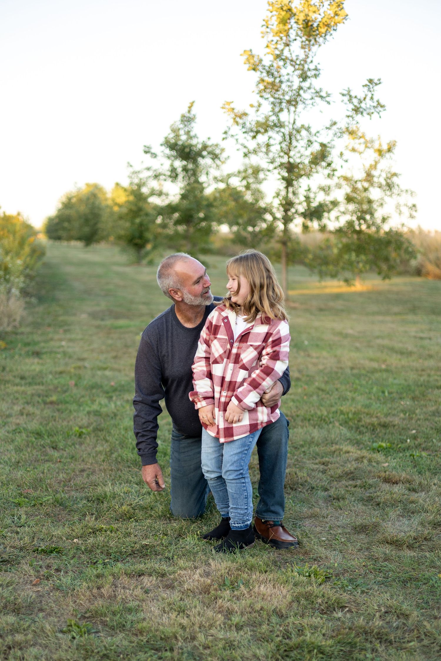 Central, Illinois Family Photographer captures a family together at Centennial Park, Springfield, IL