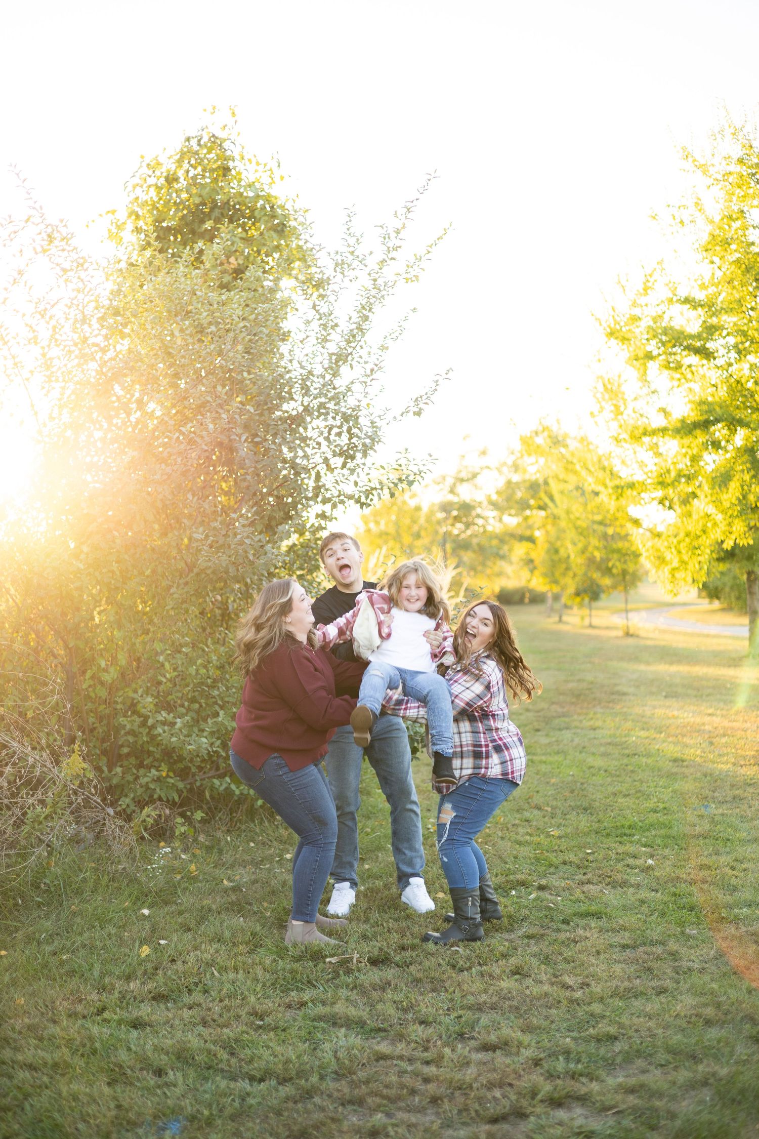 Central, Illinois Family Photographer captures a family together at Centennial Park, Springfield, IL