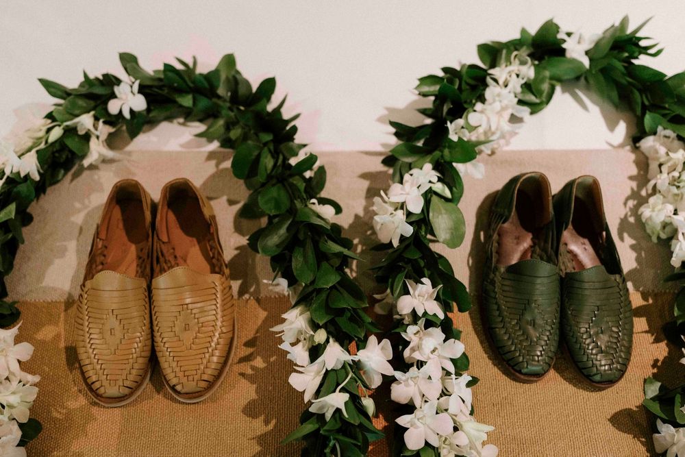 Grooms shoes for a flat lay and flowers
