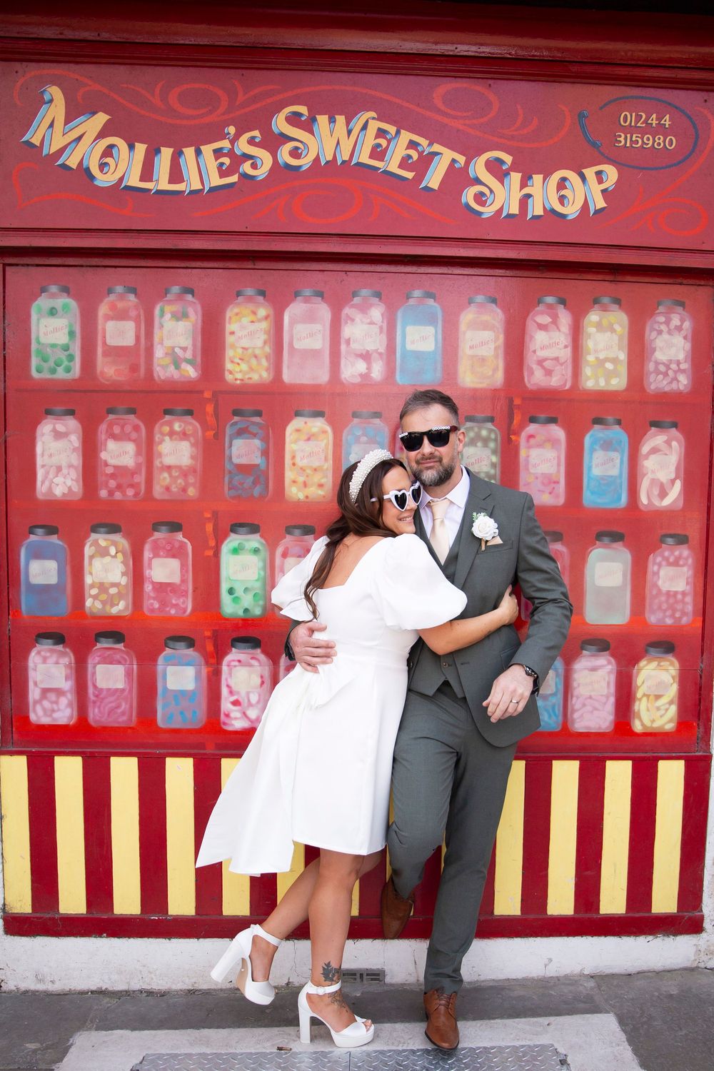 Bride and groom portraits in Chester city centre Mollies Sweet Shop alternative bride and groom wedding