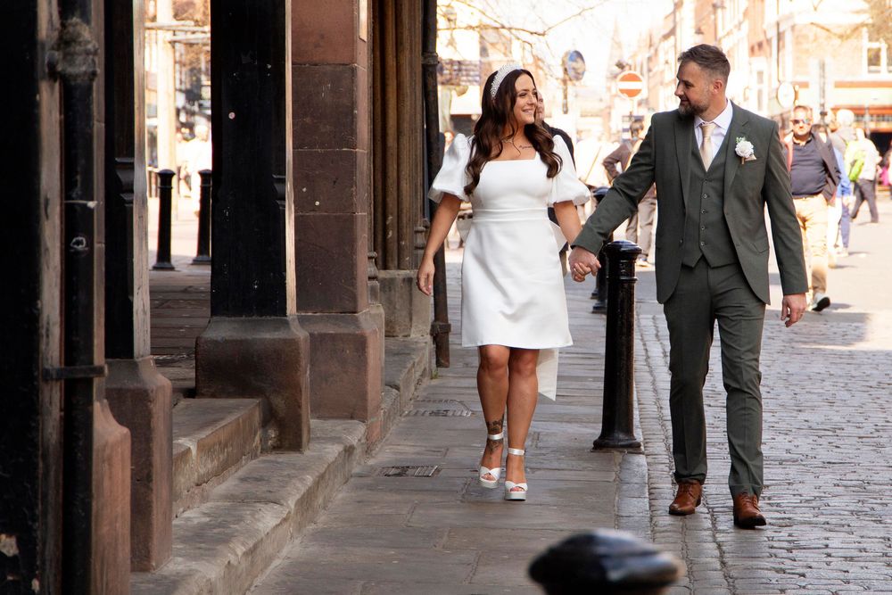 Bride and groom portraits in Chester city centre cobbled street alternative bride and groom wedding