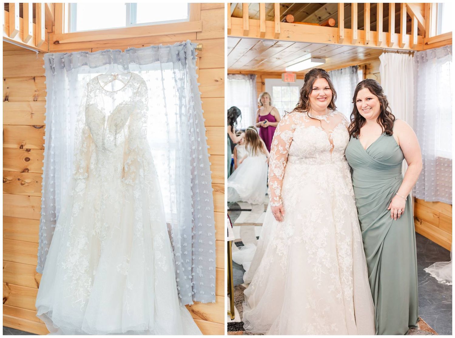 A white lace wedding gown hangs in a rustic wooden room next to two women in formal dresses.