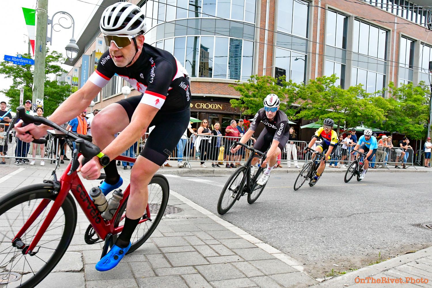 bicycle racers rounding a corner