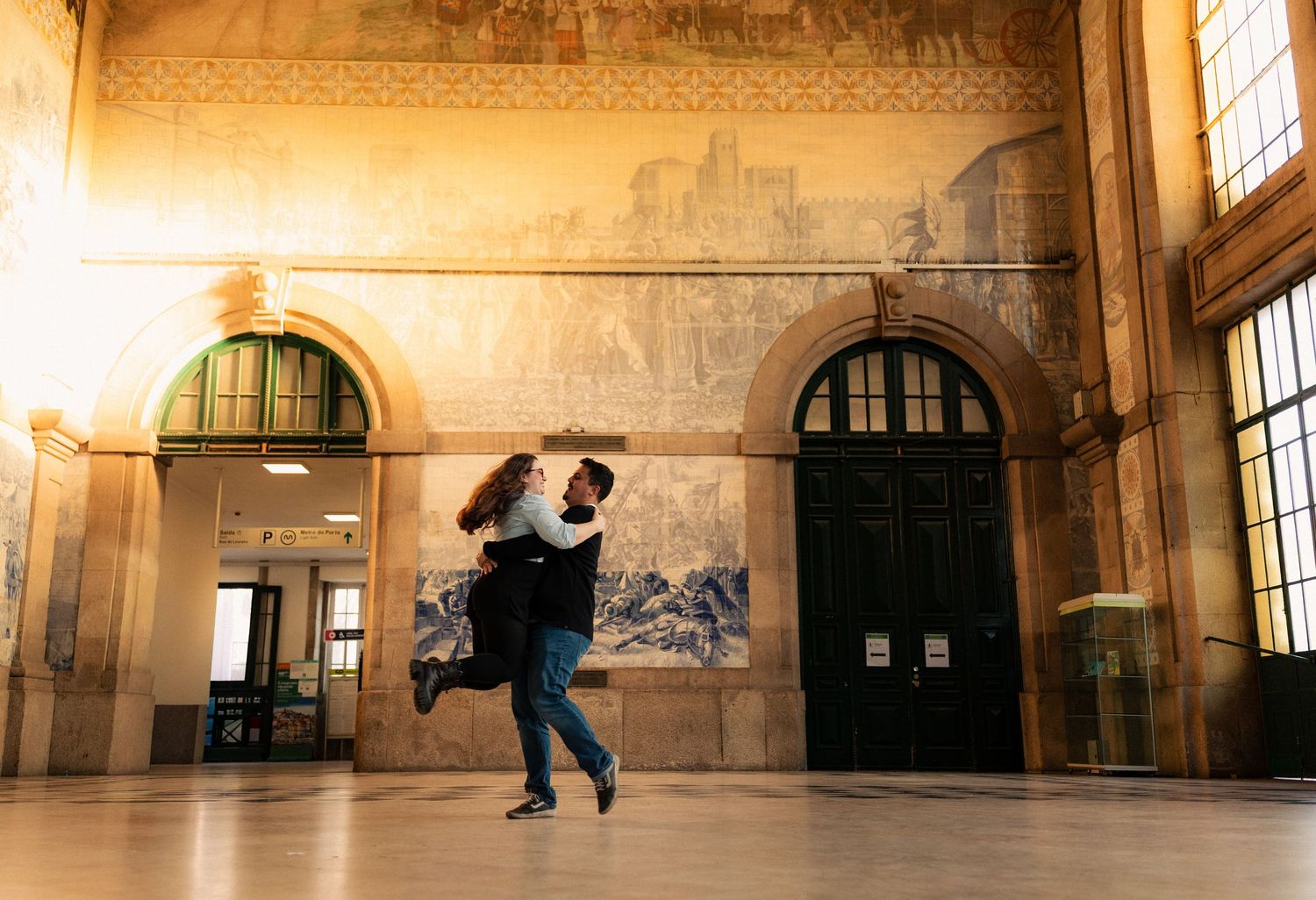 Panoramic romantic photoshoot overlooking historic Porto cityscape and architecture.