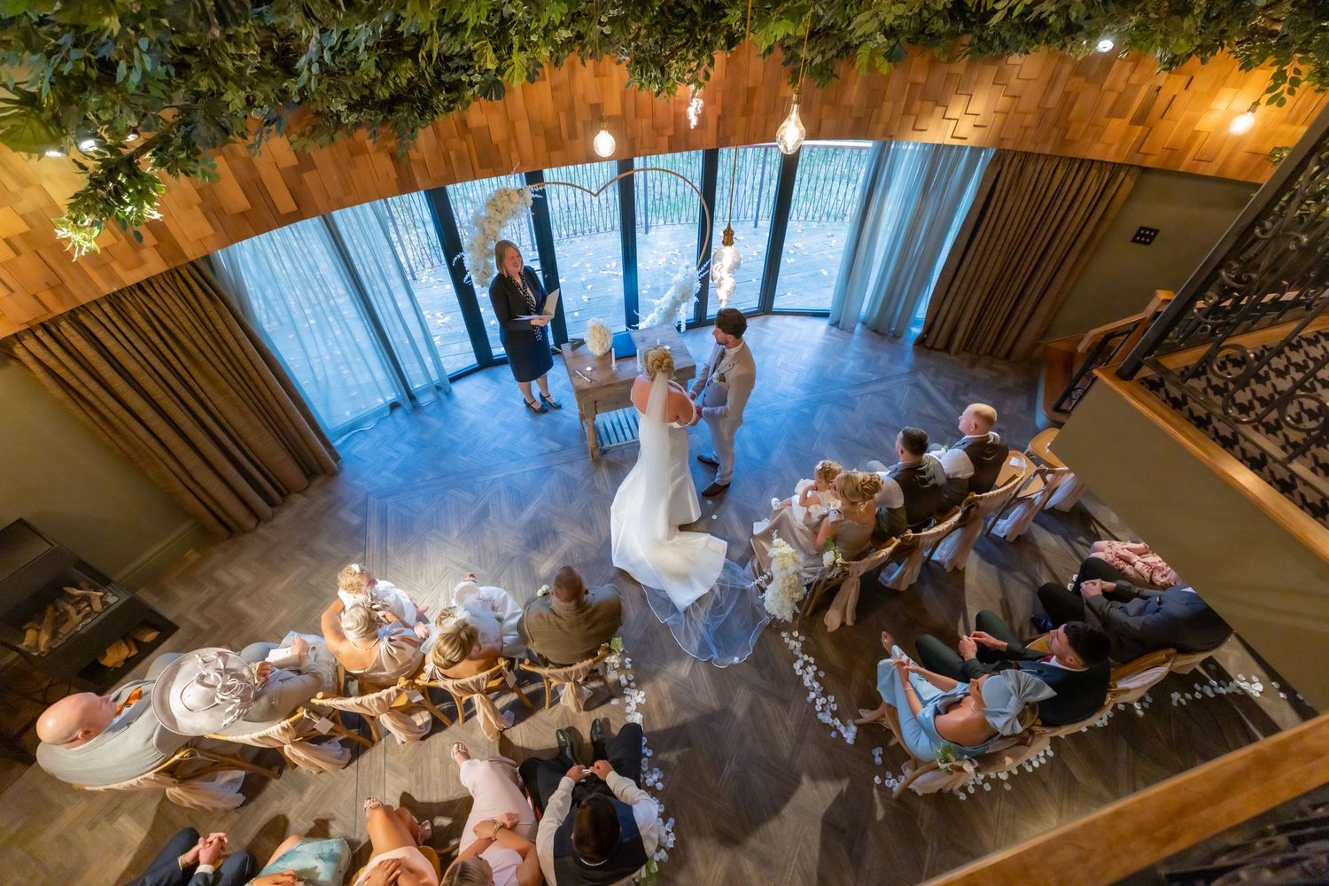 A series of overhead shots showing a rustic restaurant dining room with wooden tables and warm lighting. Ramside Hall Wedding Durham