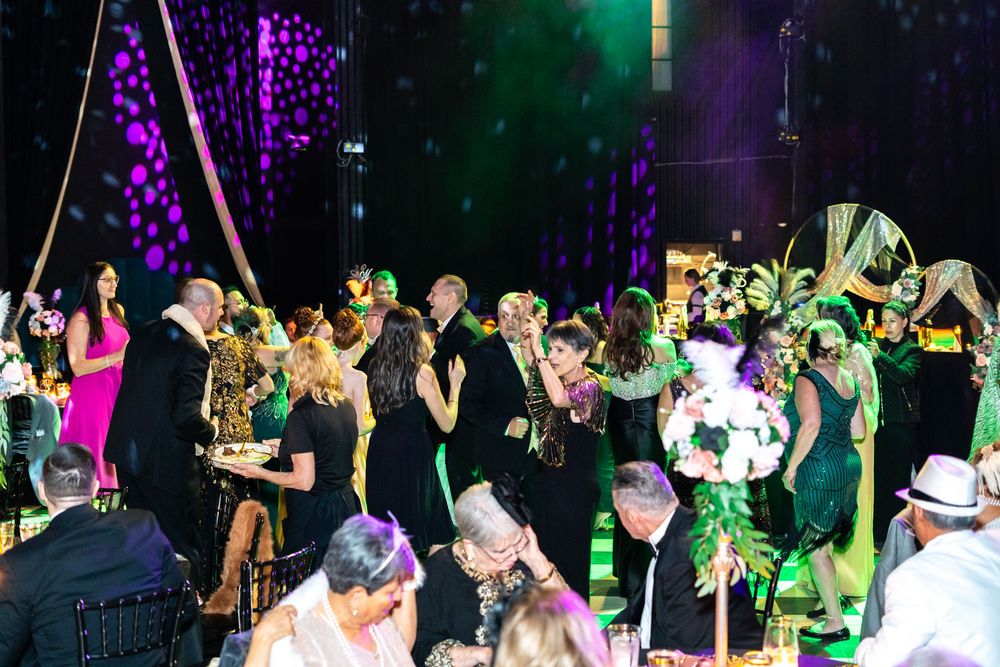 The guests are dancing.