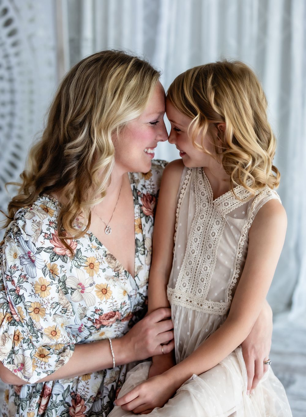 A tender moment captured in a series of three intimate photos showing two people embracing and smiling together.