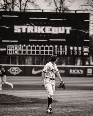 Black and white sequence of baseball pitching motions showing follow-through mechanics on a baseball field.