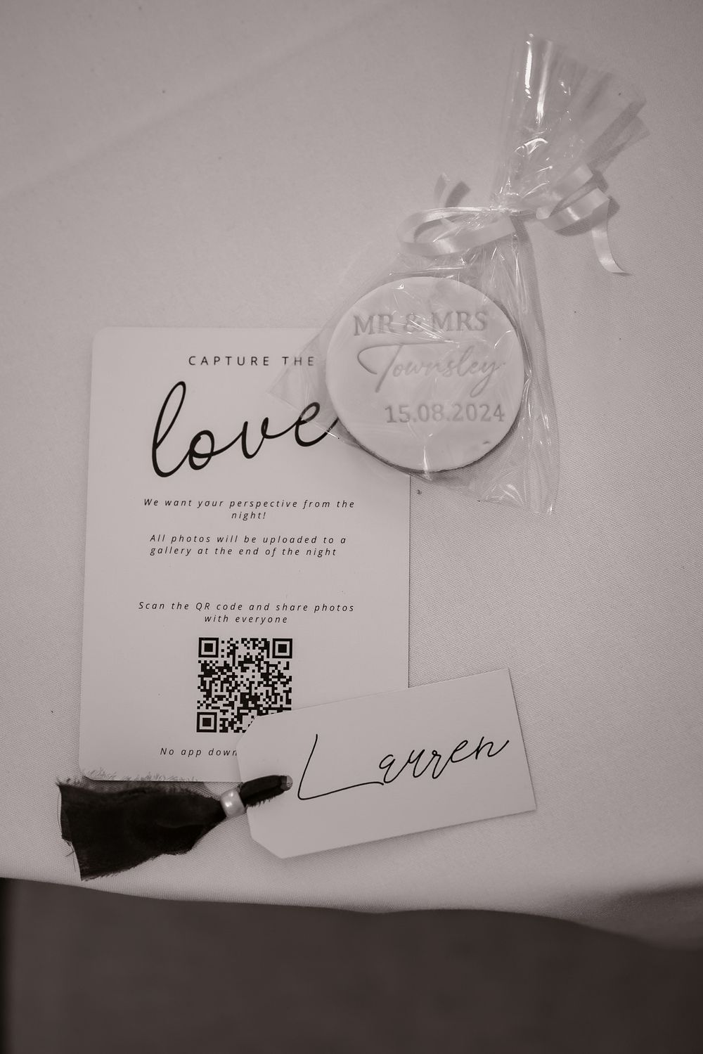Wedding stationery and QR code details in black and white monochrome style.