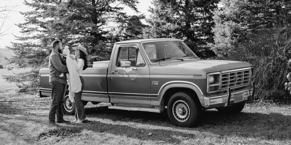 A vintage black and white photo series showing a pickup truck being loaded with hay bales in a rural farm setting.