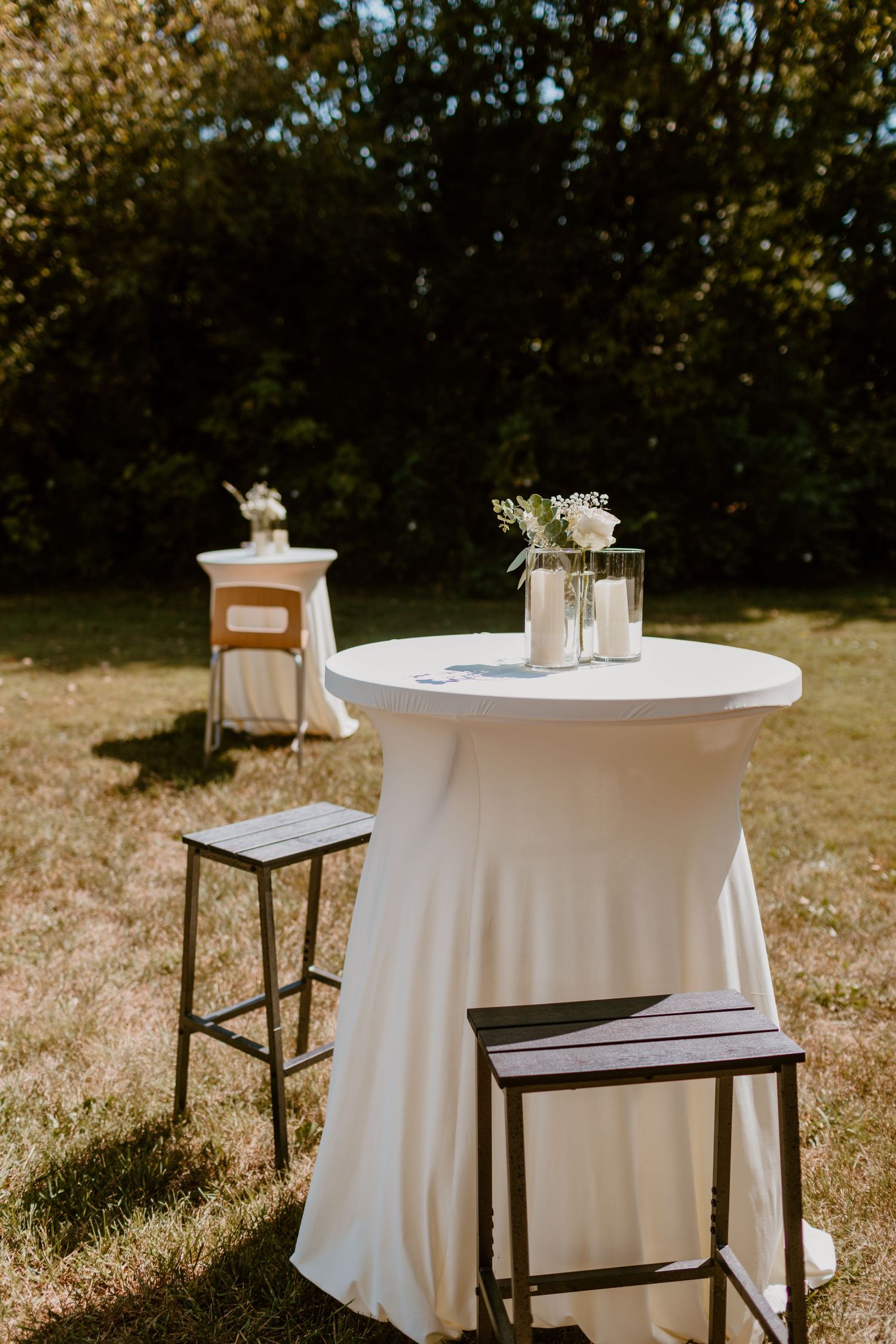 Cocktail tables summer backyard wedding in Ohio photography by Vicci Photo Dayton Ohio Photographer