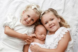 Newborn with siblings in Menifee California photoshoot.