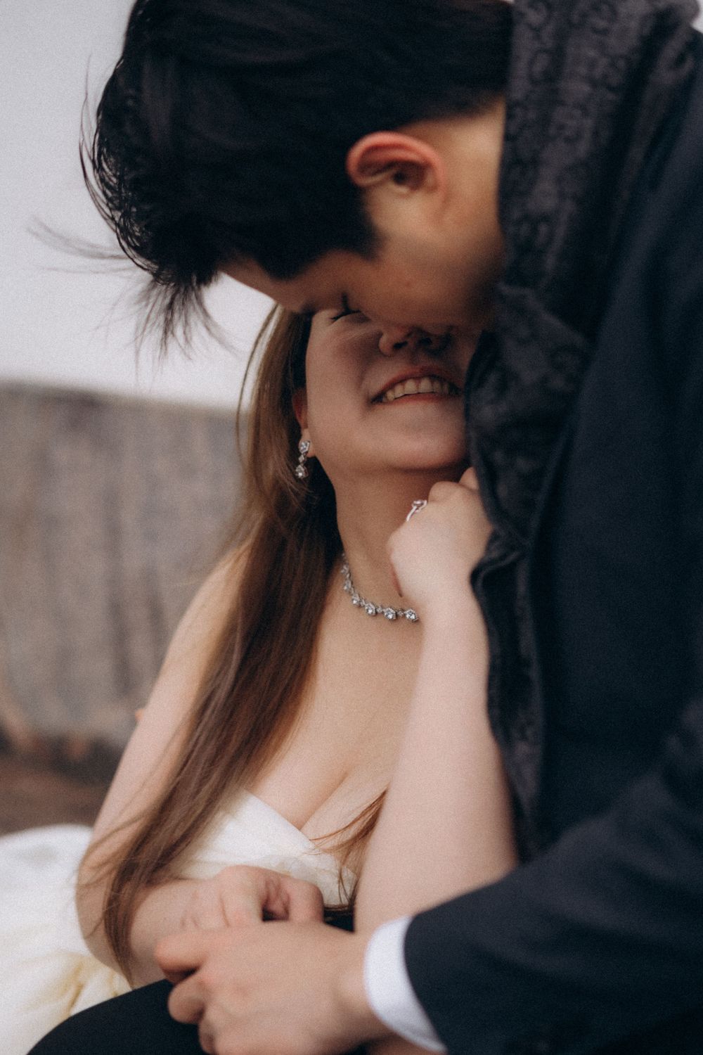 Close-up of an engaged couple sharing a tender moment during a Helsinki engagement session