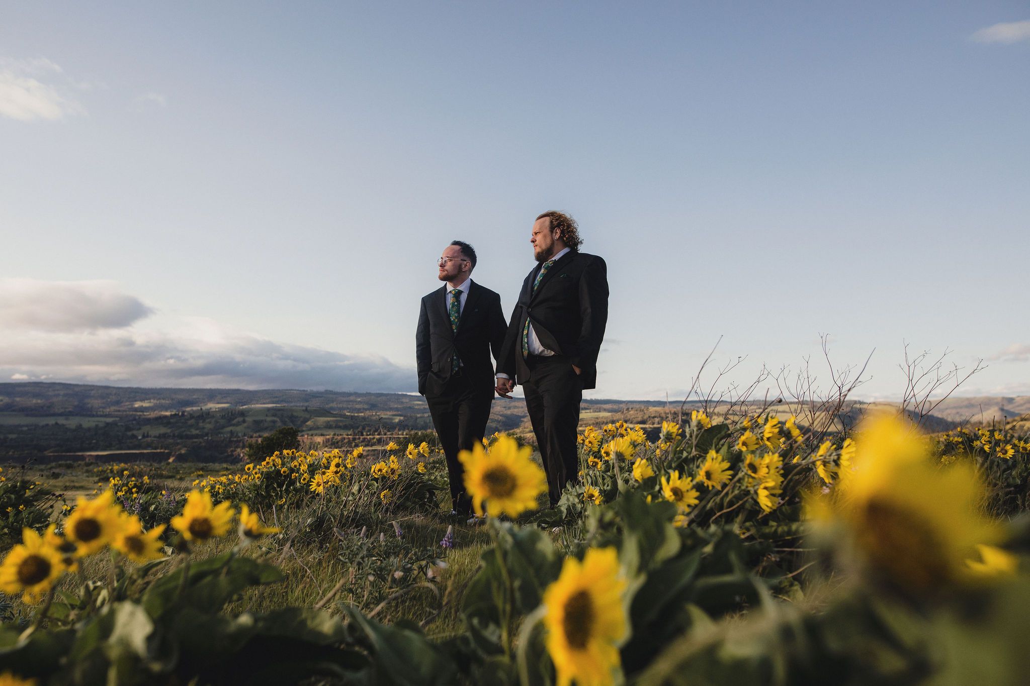 LGBTQ elopement on Rowena Crest during wildflower season in Oregon.