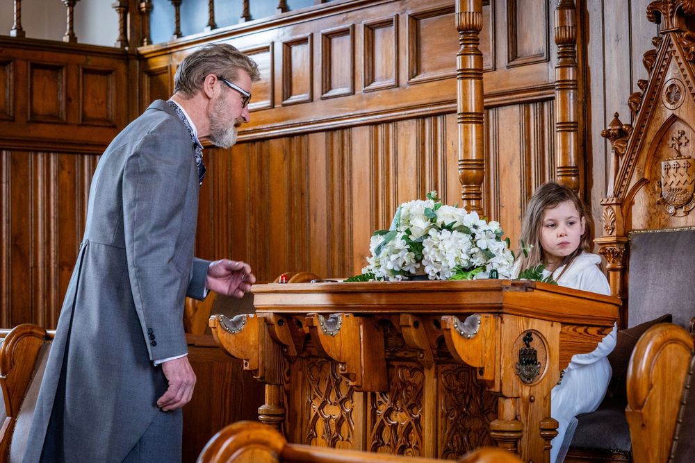 Groom and granddaughter. Emotional wedding ceremony moment at Southport Town Hall, natural reactions in historic North West venue